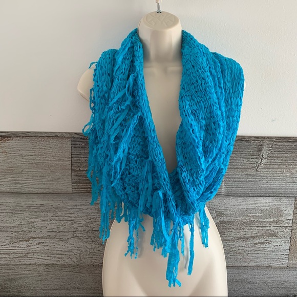 Steve Madden infinity scarves with fringe.  
Vibrant orange and teal - Picture 2 of 4